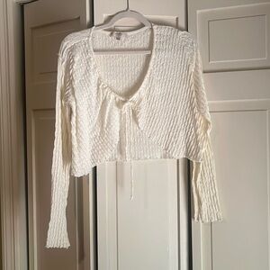 Cream cardigan, crop top ties in the front